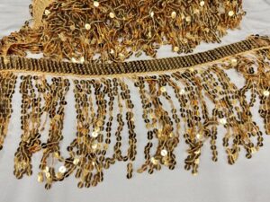 Frange paillettes oro